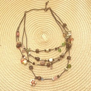 Fun multi bead triple strand necklace